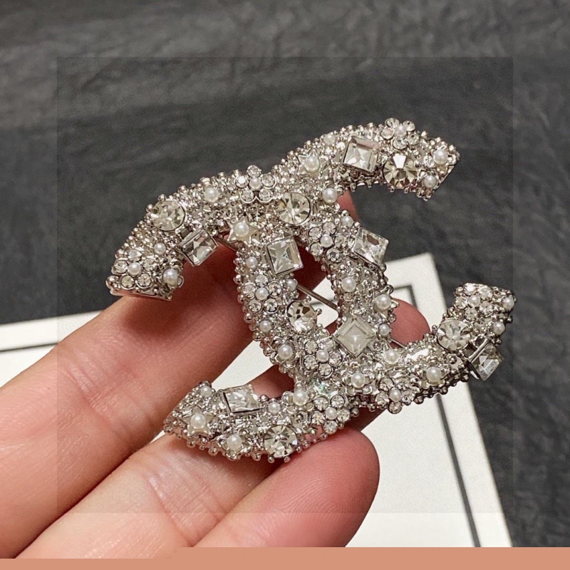 Ch*el brooches
